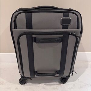Tumi Black and Gray Travel Suitcase